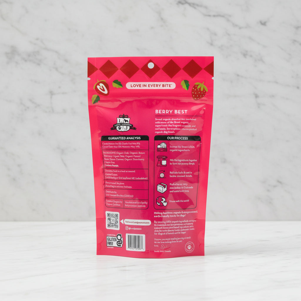 Pink package of 'Berry Best' dog food with text and graphics on a white background