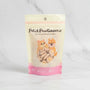 Petit Pawtisserie pet treats packaging with cartoon cats on a white background
