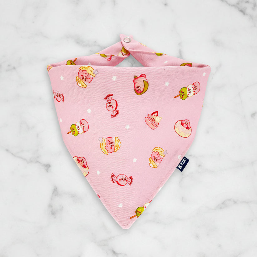 Pink bandana with cartoon character pattern on a white background