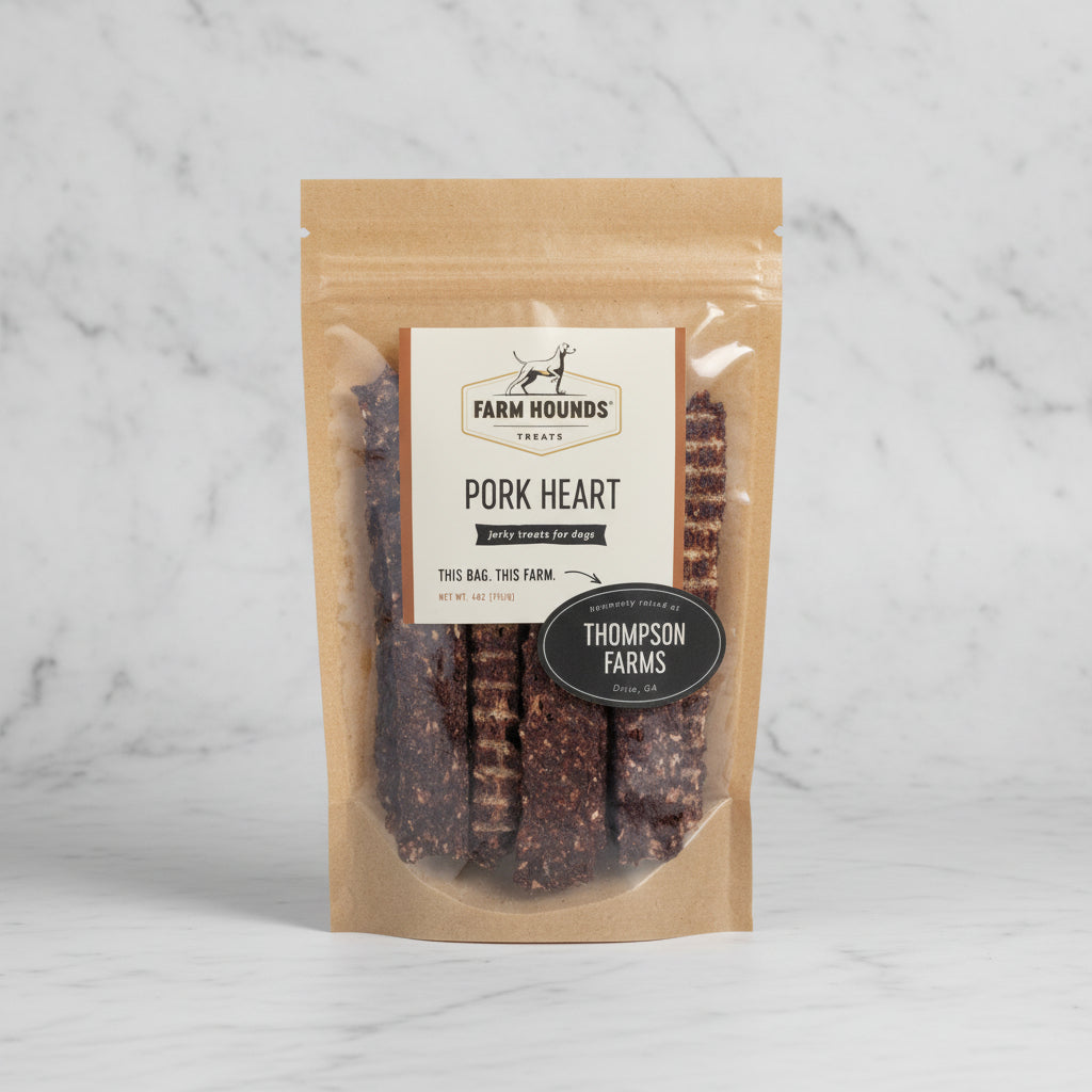 Package of Farm Hounds pork heart treats for dogs with visible branding.
