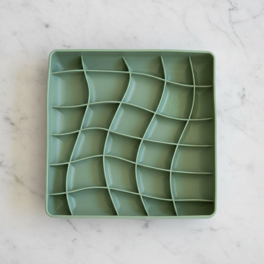 Green silicone dog enrichment slow feeder