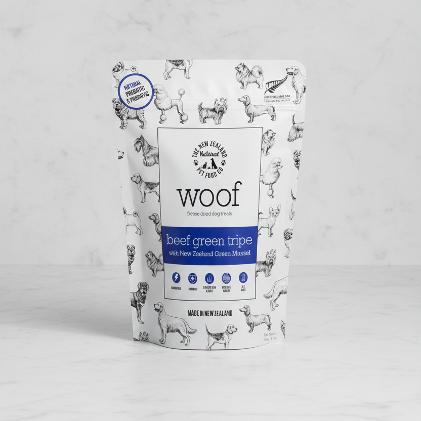Package of Woof beef green tripe dog treats with illustrations of dogs on a white background