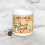Container of Happy Dingo dog supplement with a small treat on a white background