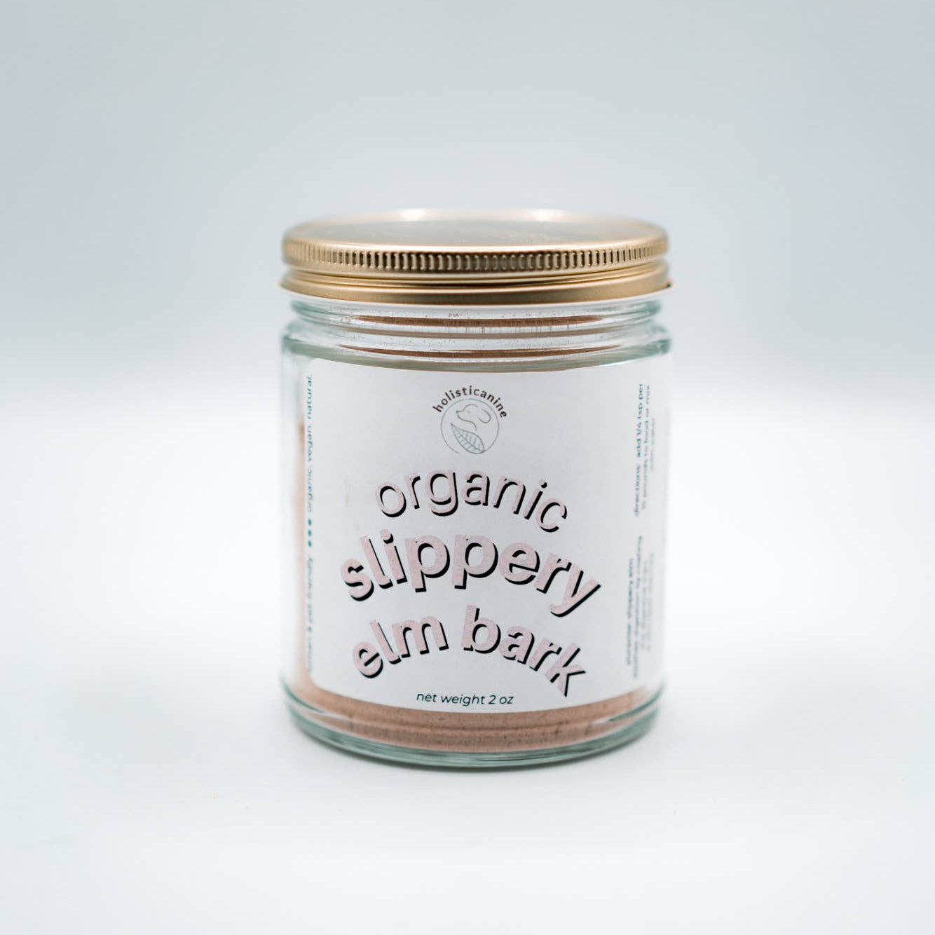 Jar of organic slippery elm bark on a white background